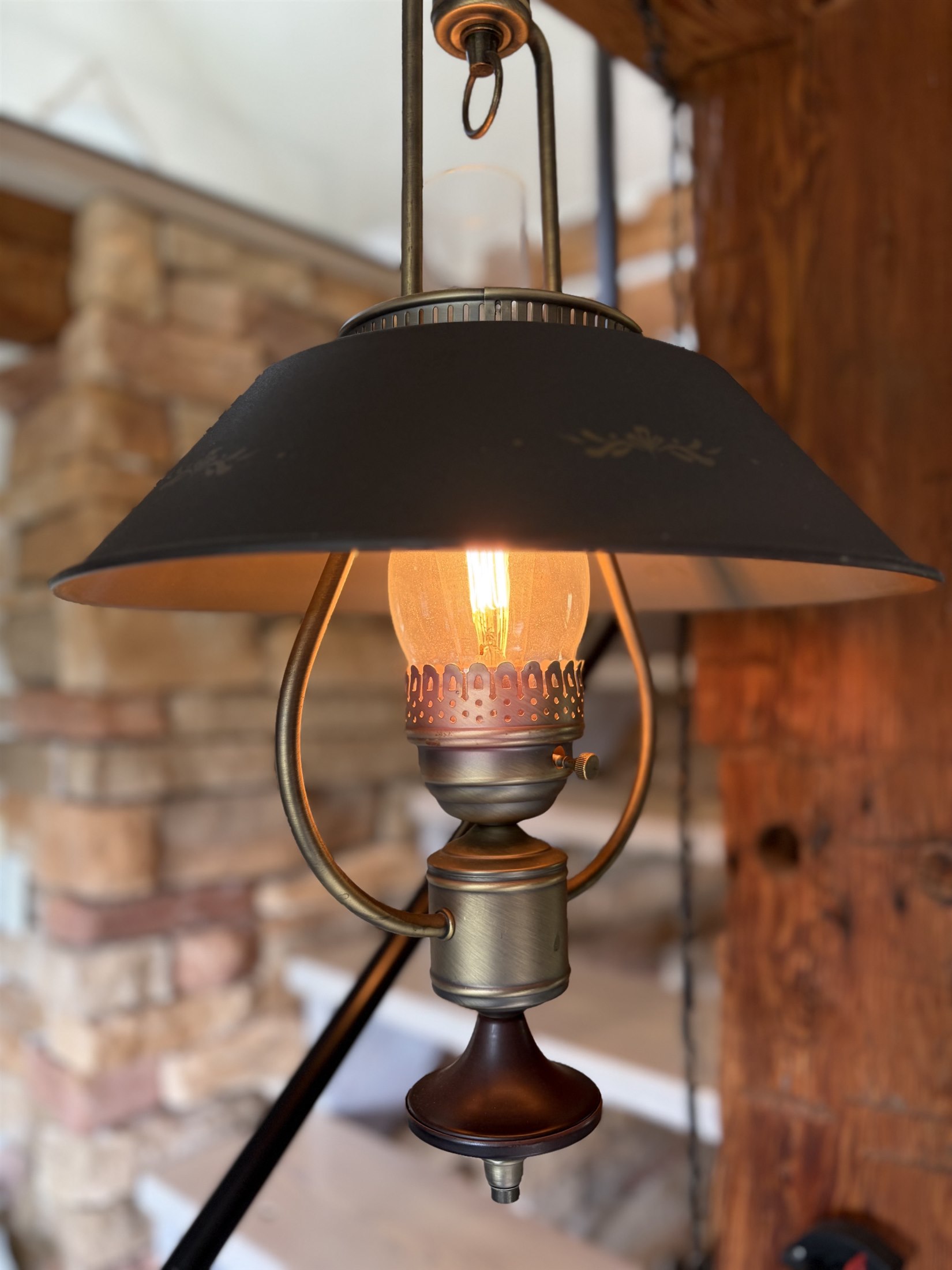 A vintage lamp glowing inside The Cabin