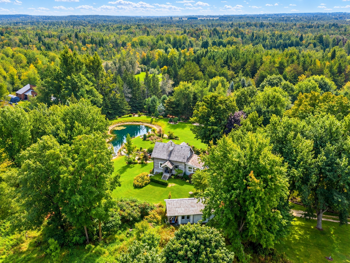 Aerial view of the full Maple Lane property in Mono, Ontario